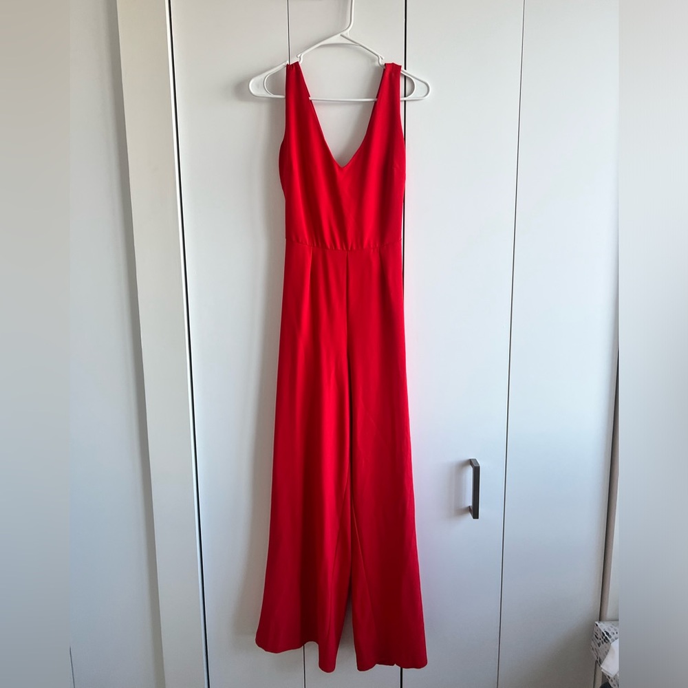 Red dressy jumpsuit with wide leg pants